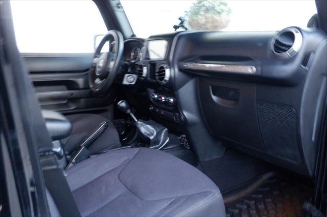 used 2013 Jeep Wrangler Unlimited car, priced at $13,825