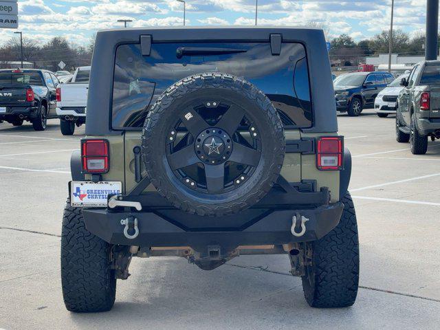 used 2013 Jeep Wrangler Unlimited car, priced at $15,999