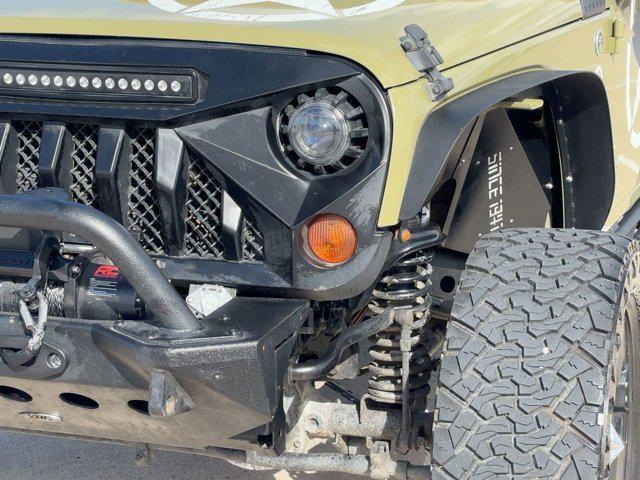 used 2013 Jeep Wrangler Unlimited car, priced at $15,999