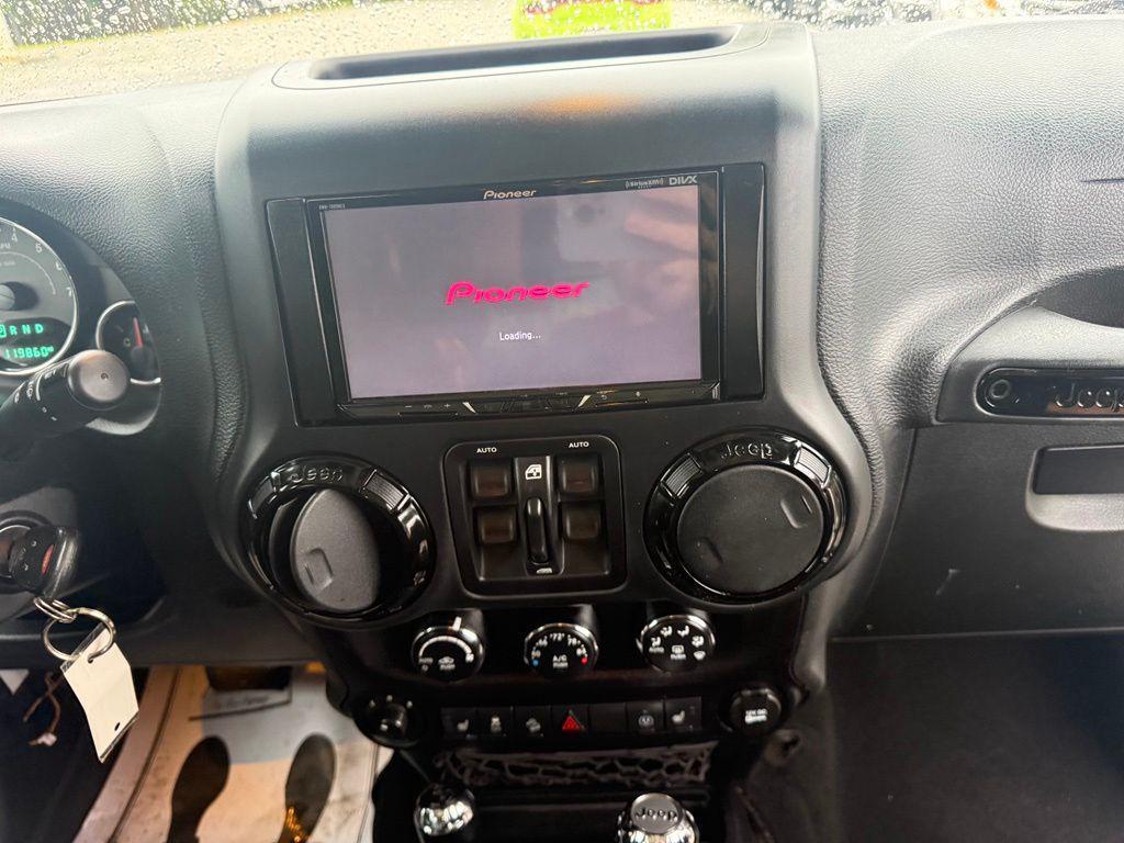 used 2015 Jeep Wrangler Unlimited car, priced at $16,318