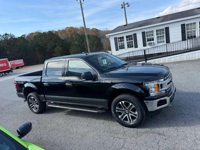used 2018 Ford F-150 car, priced at $23,370
