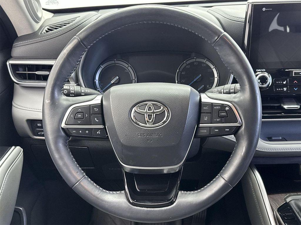 used 2021 Toyota Highlander Hybrid car, priced at $30,598