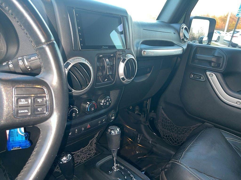 used 2015 Jeep Wrangler Unlimited car, priced at $20,554