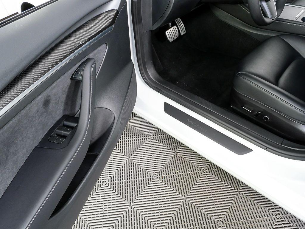 used 2023 Tesla Model 3 car, priced at $30,994