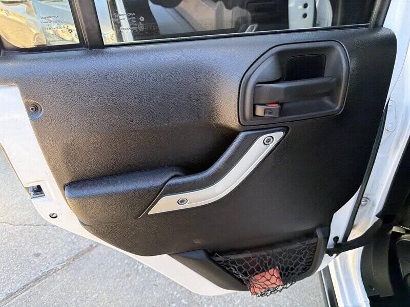 used 2015 Jeep Wrangler Unlimited car, priced at $18,995