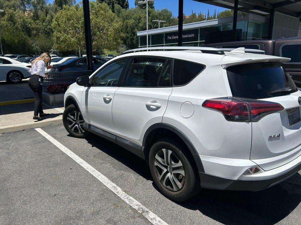 used 2016 Toyota RAV4 car, priced at $19,656