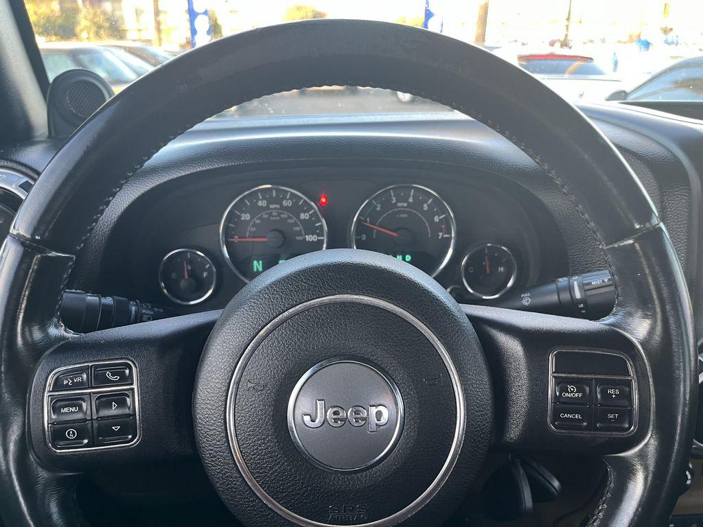 used 2014 Jeep Wrangler Unlimited car, priced at $13,995