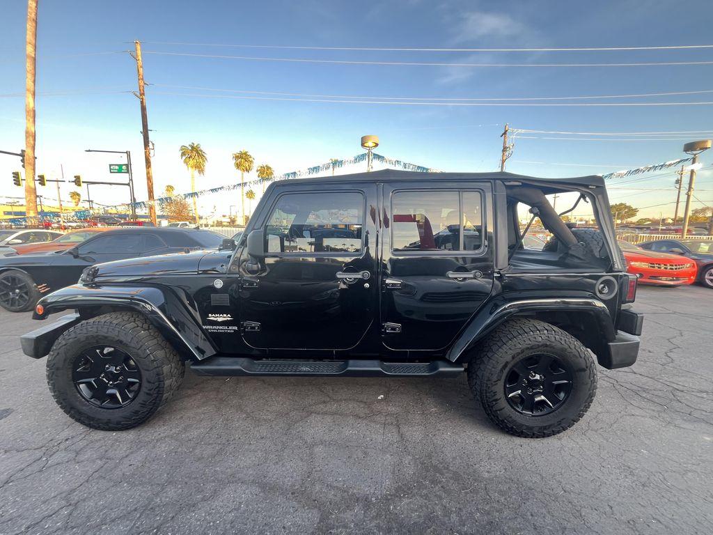 used 2014 Jeep Wrangler Unlimited car, priced at $13,995
