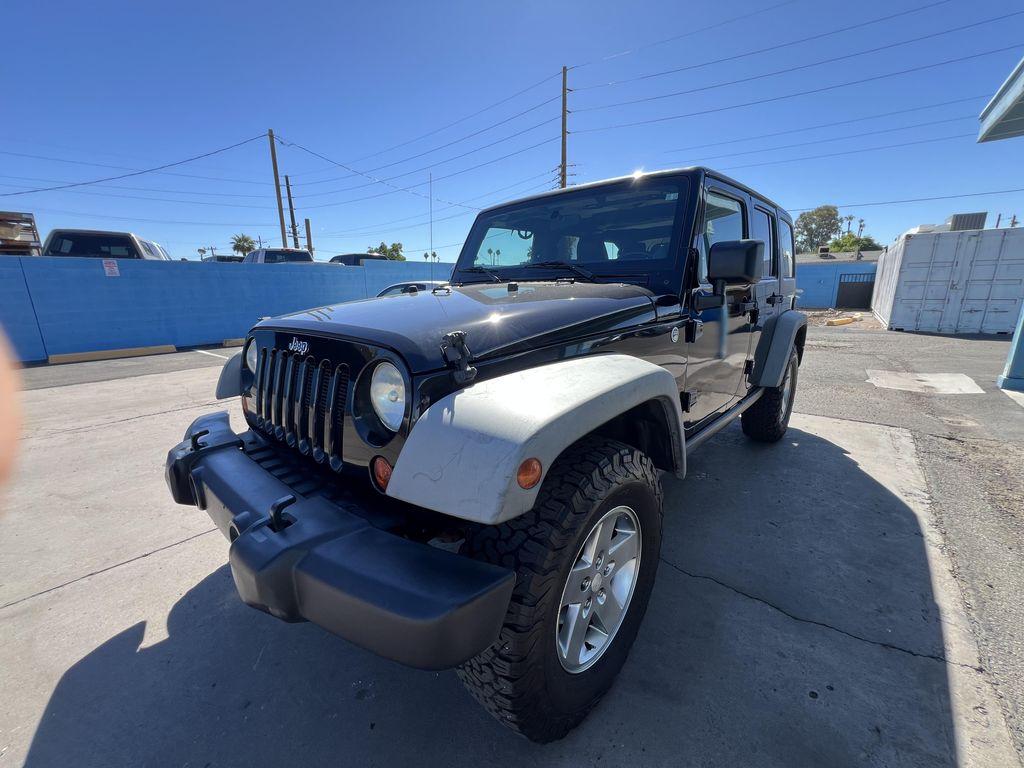 used 2012 Jeep Wrangler Unlimited car, priced at $14,995