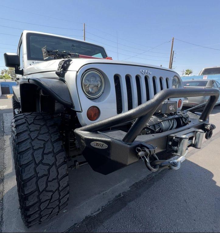 used 2010 Jeep Wrangler Unlimited car, priced at $13,995
