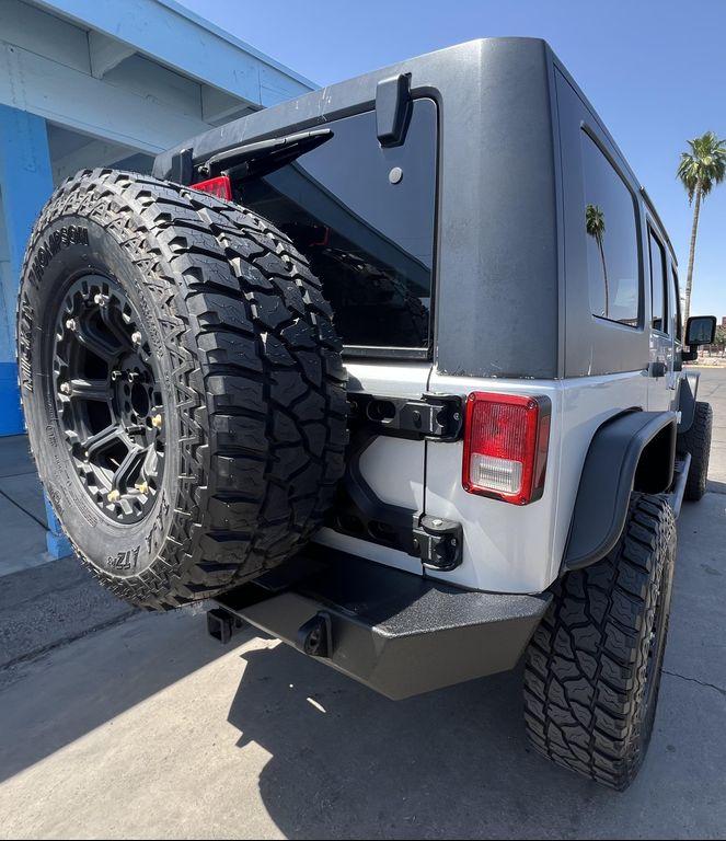 used 2010 Jeep Wrangler Unlimited car, priced at $13,995