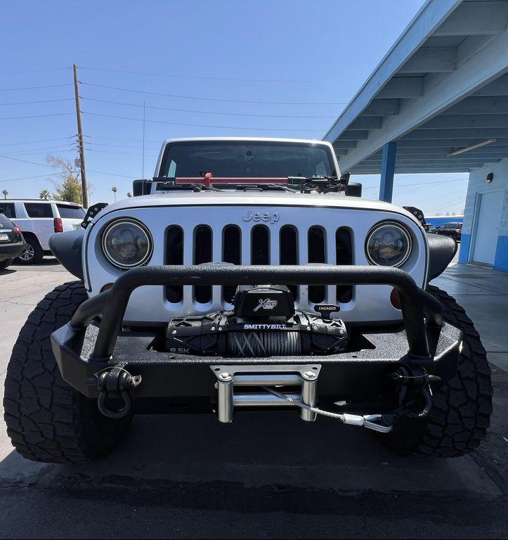 used 2010 Jeep Wrangler Unlimited car, priced at $13,995