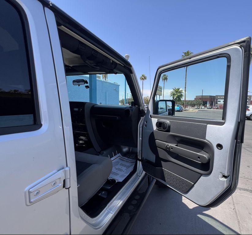 used 2010 Jeep Wrangler Unlimited car, priced at $13,995