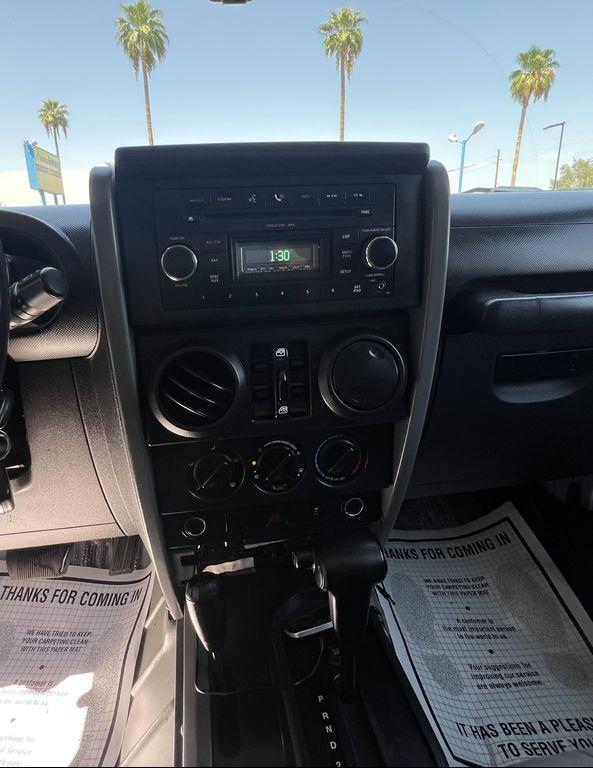 used 2010 Jeep Wrangler Unlimited car, priced at $13,995