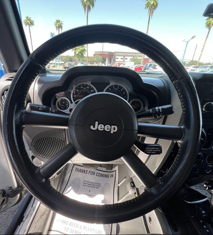 used 2010 Jeep Wrangler Unlimited car, priced at $13,995