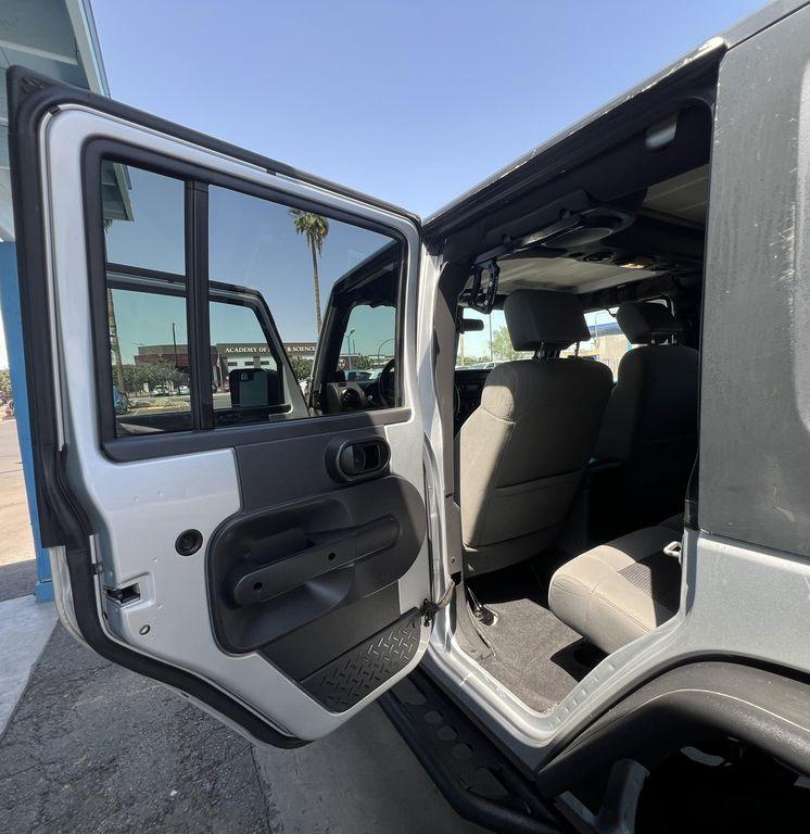 used 2010 Jeep Wrangler Unlimited car, priced at $13,995