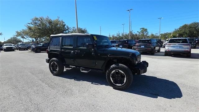 used 2011 Jeep Wrangler Unlimited car, priced at $12,647