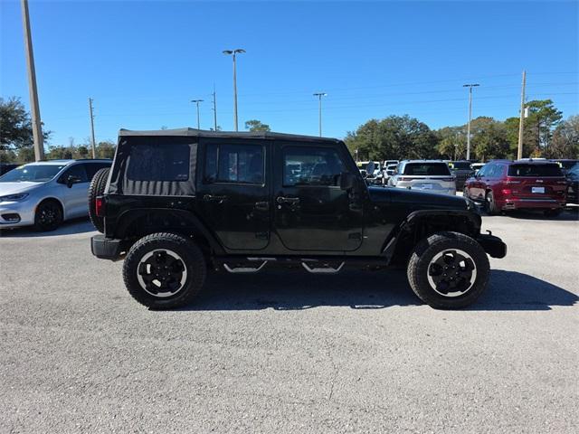 used 2011 Jeep Wrangler Unlimited car, priced at $12,647