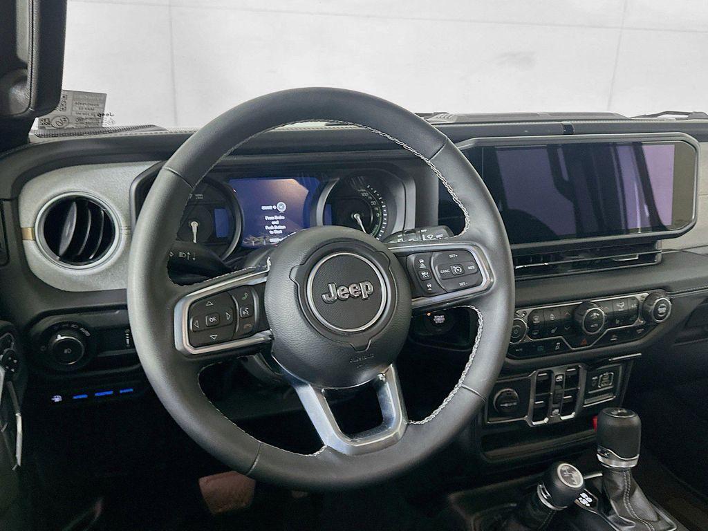 used 2025 Jeep Wrangler 4xe car, priced at $30,712