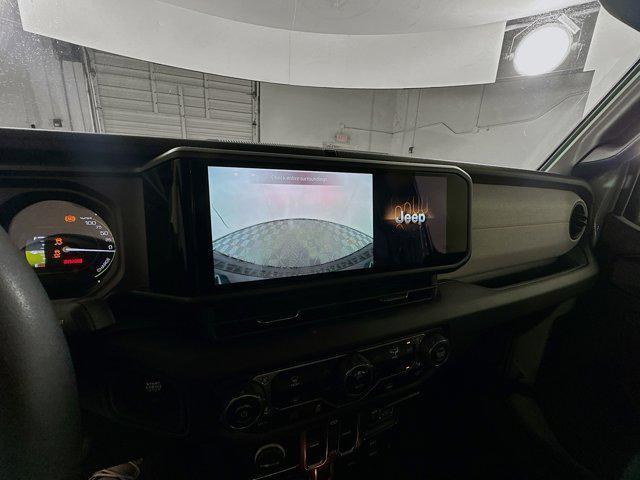 used 2024 Jeep Wrangler 4xe car, priced at $29,996