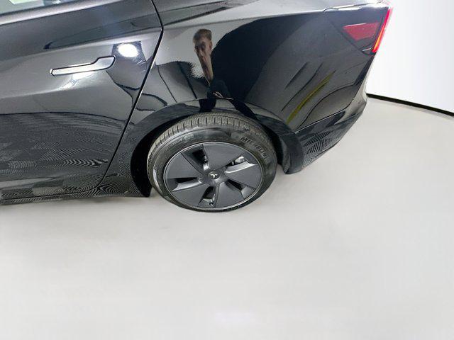 used 2023 Tesla Model 3 car, priced at $27,697