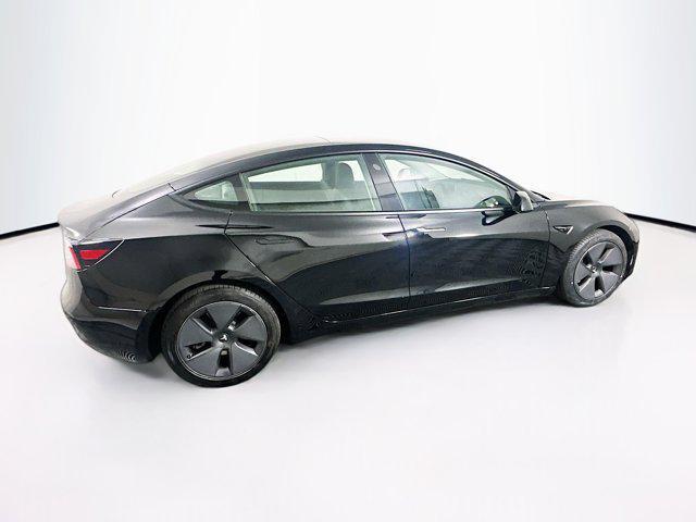 used 2023 Tesla Model 3 car, priced at $27,697