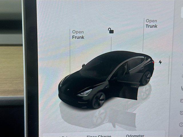 used 2023 Tesla Model 3 car, priced at $27,697