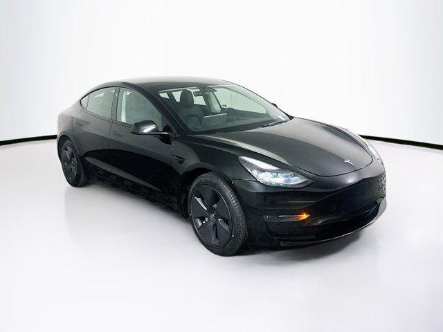 used 2023 Tesla Model 3 car, priced at $27,697