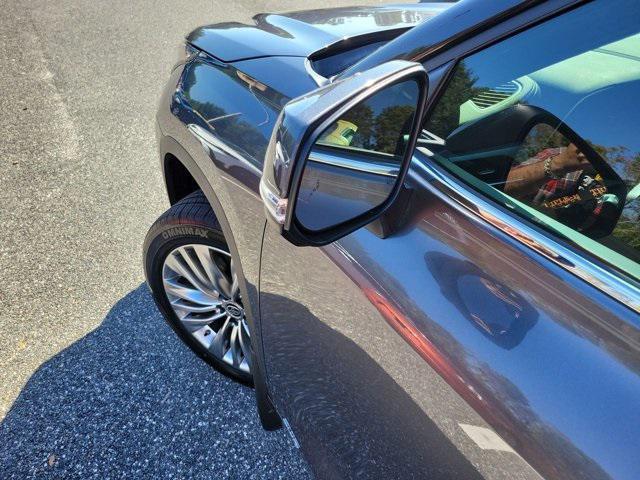 used 2024 Toyota Highlander Hybrid car, priced at $49,599