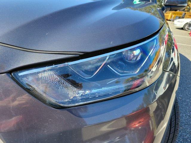 used 2024 Toyota Highlander Hybrid car, priced at $49,599