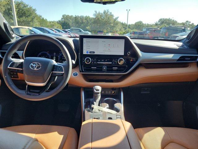 used 2024 Toyota Highlander Hybrid car, priced at $49,599