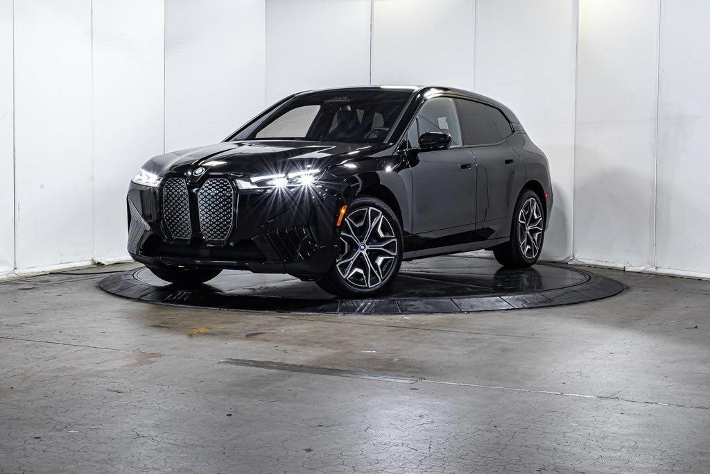 used 2025 BMW iX car, priced at $63,880