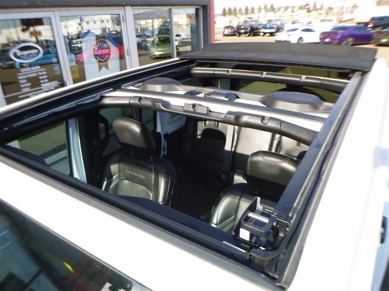 used 2023 Jeep Wrangler 4xe car, priced at $32,682