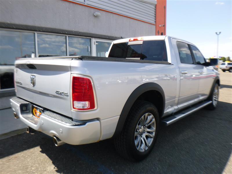 used 2014 Ram 1500 car, priced at $21,633