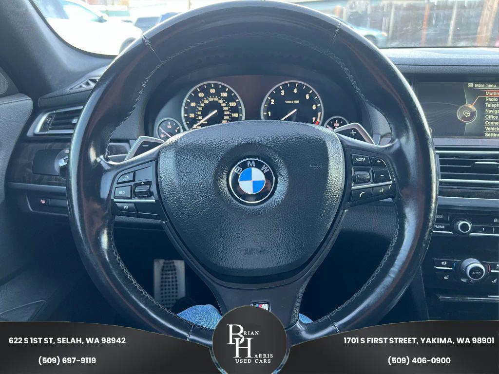 used 2013 BMW 740 car, priced at $9,999