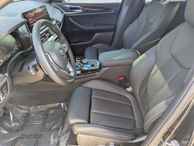 used 2023 BMW X4 car, priced at $37,498