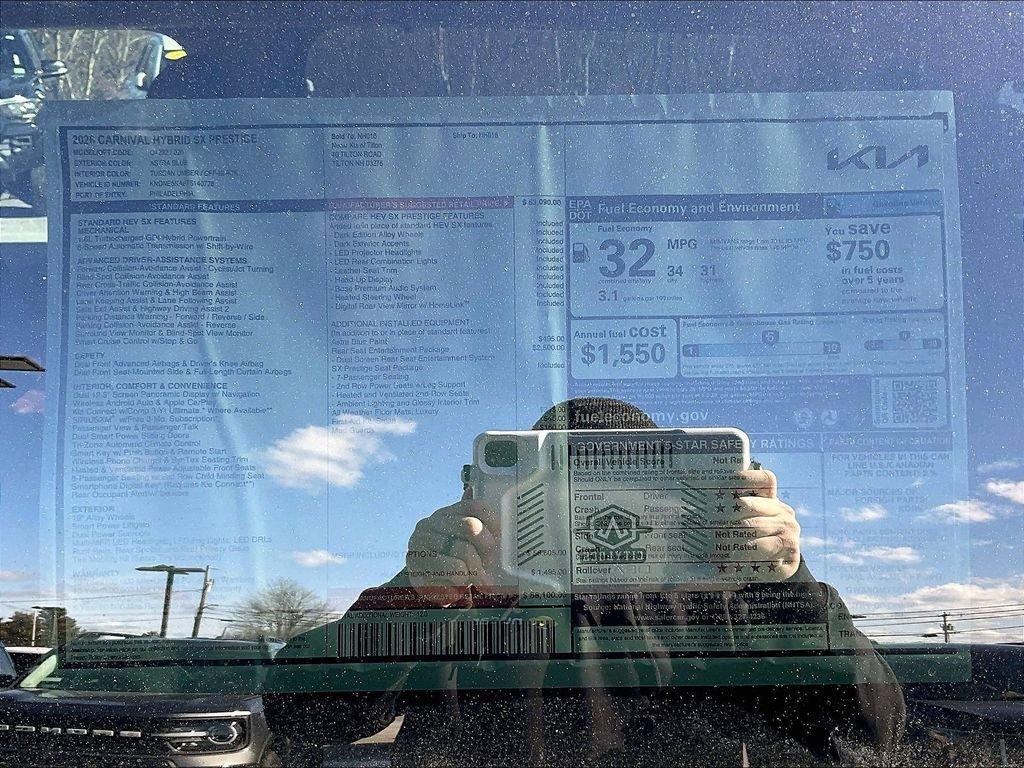 new 2026 Kia Carnival Hybrid car, priced at $56,592