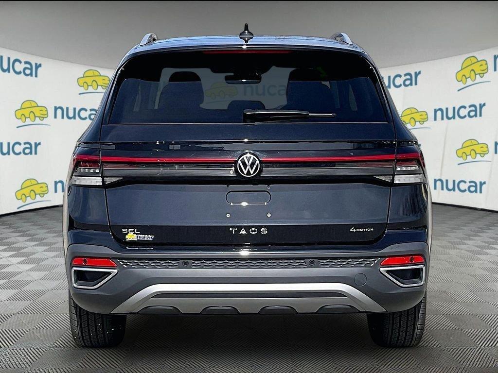 used 2025 Volkswagen Taos car, priced at $29,676