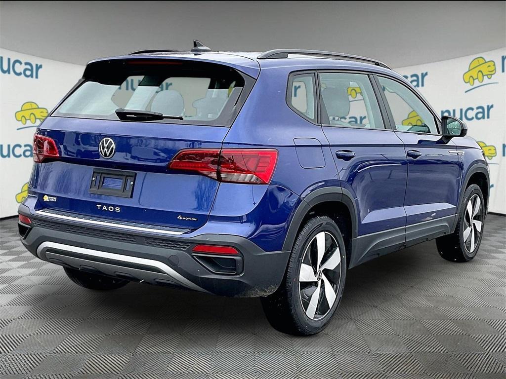 used 2023 Volkswagen Taos car, priced at $19,997