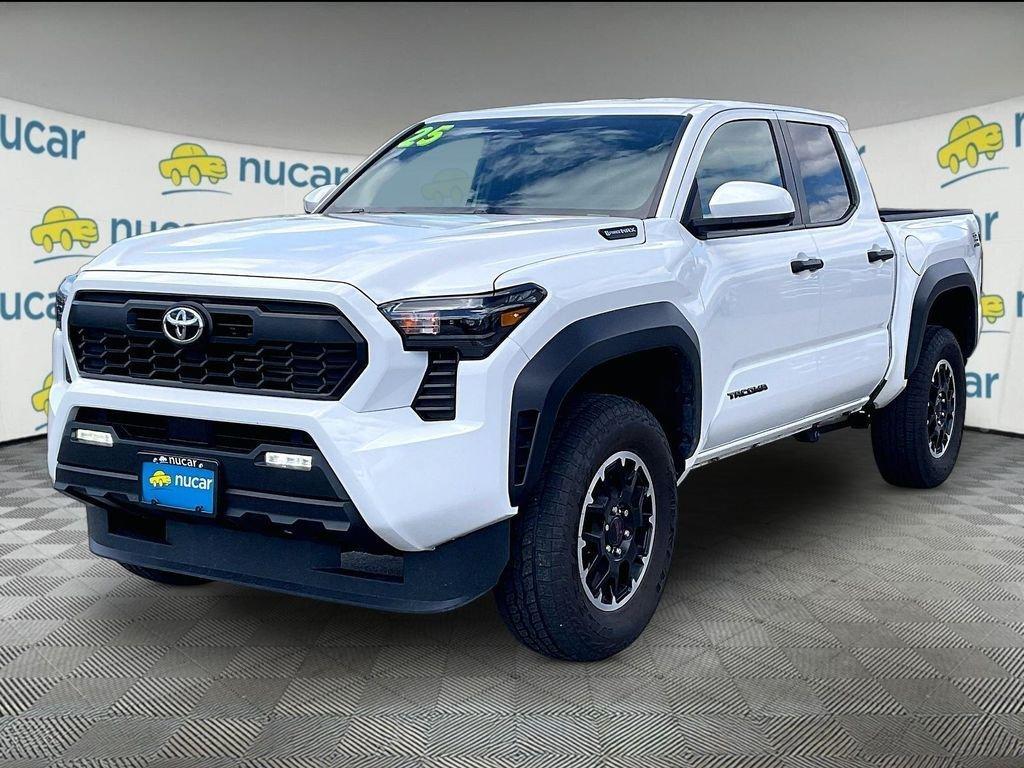 used 2025 Toyota Tacoma Hybrid car, priced at $46,122