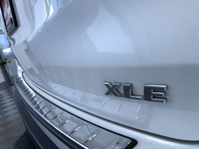 used 2019 Toyota Highlander Hybrid car, priced at $29,988