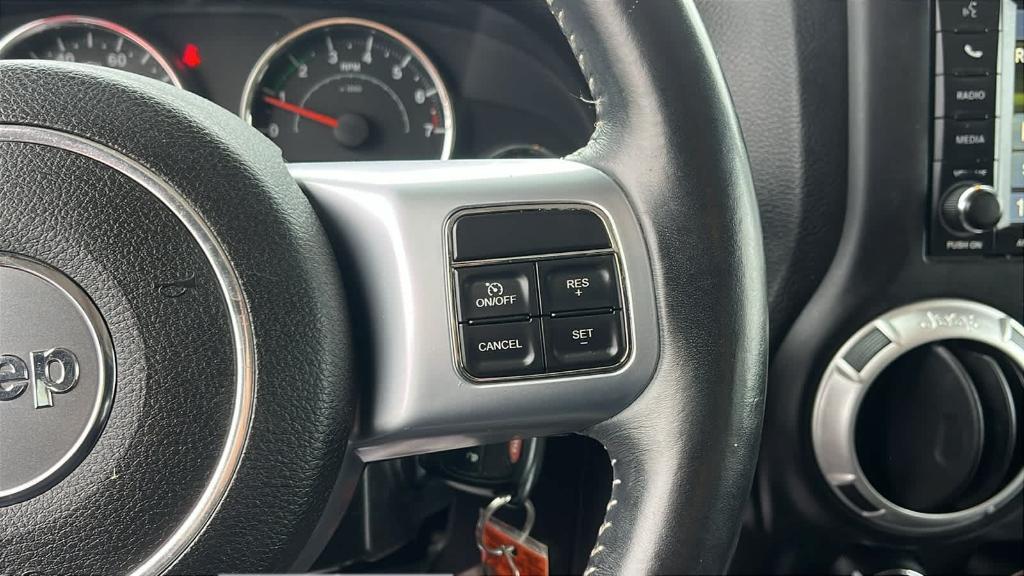 used 2015 Jeep Wrangler Unlimited car, priced at $13,992