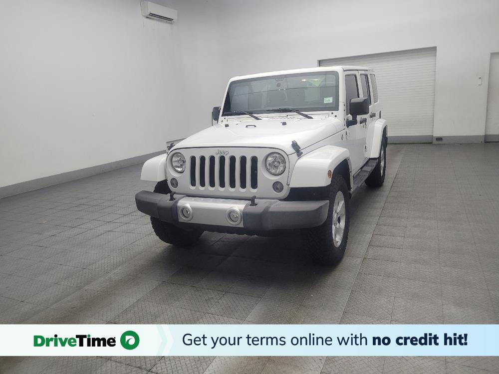 used 2015 Jeep Wrangler Unlimited car, priced at $20,295