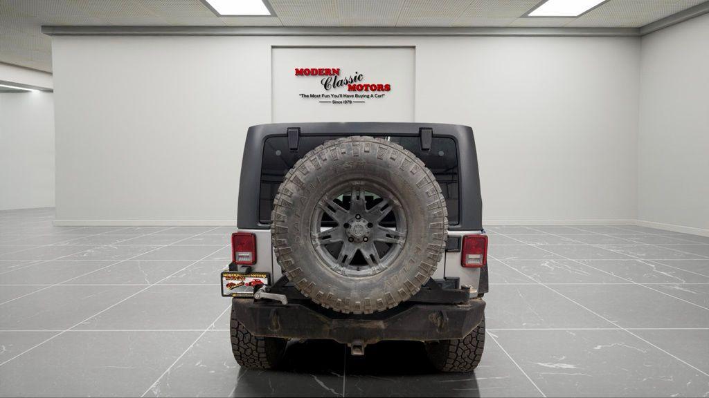 used 2013 Jeep Wrangler Unlimited car, priced at $13,494