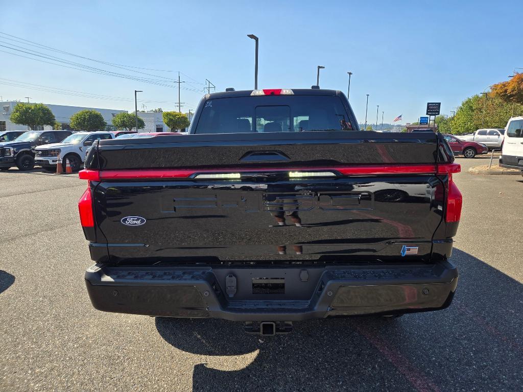 new 2025 Ford F-150 Lightning car, priced at $74,890