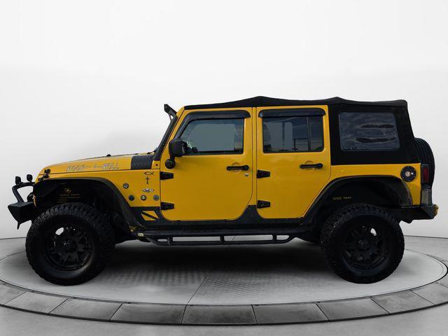 used 2015 Jeep Wrangler Unlimited car, priced at $18,672