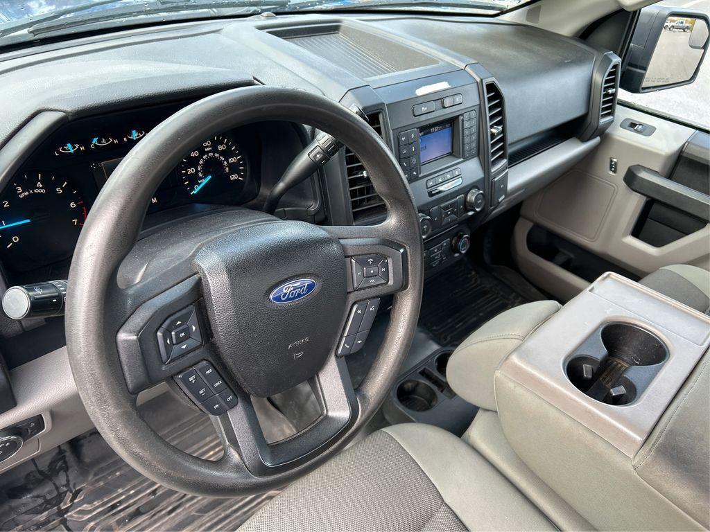 used 2018 Ford F-150 car, priced at $18,000