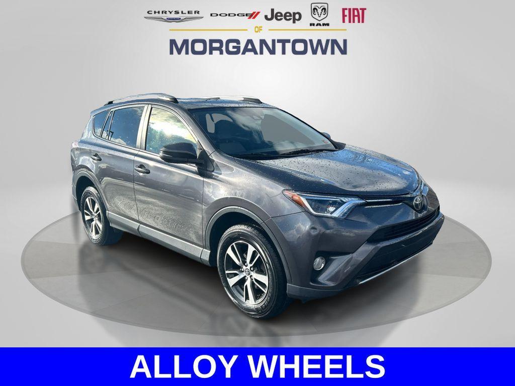 used 2018 Toyota RAV4 car, priced at $15,000
