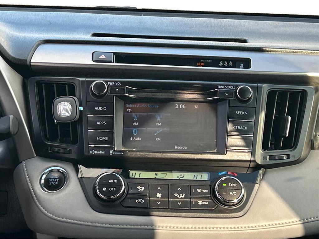 used 2018 Toyota RAV4 car, priced at $15,000