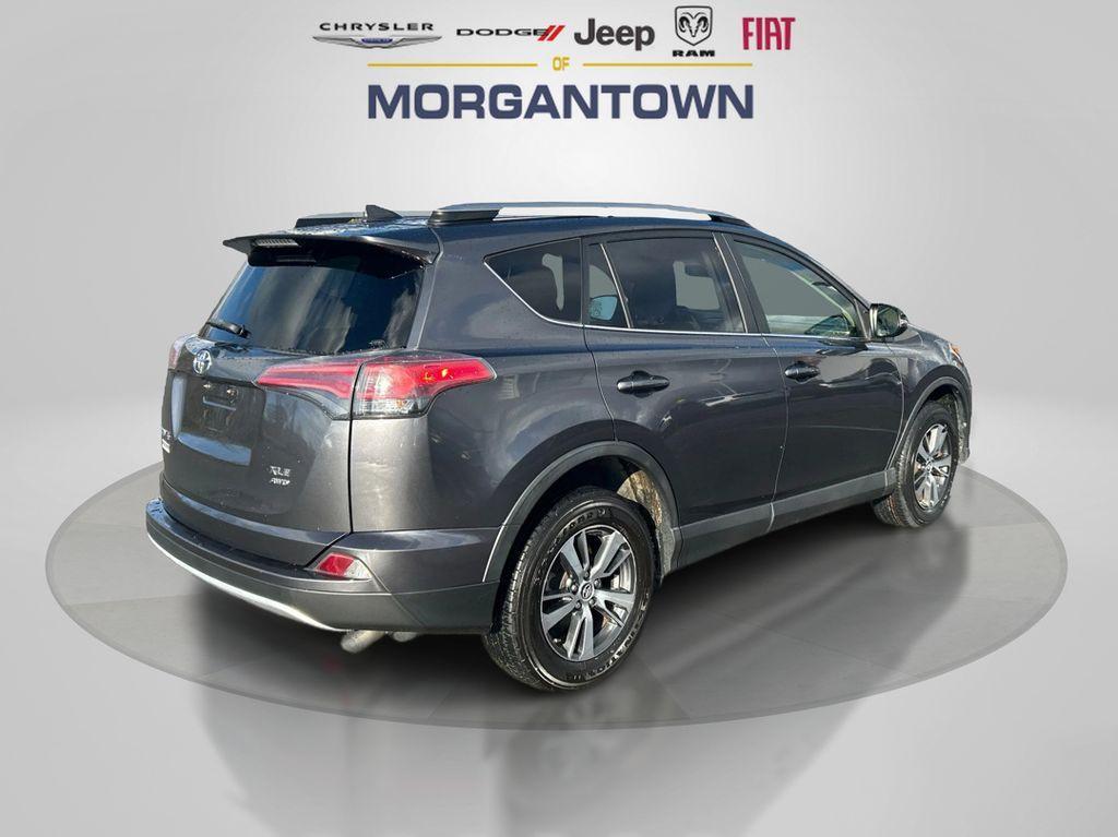 used 2018 Toyota RAV4 car, priced at $15,000